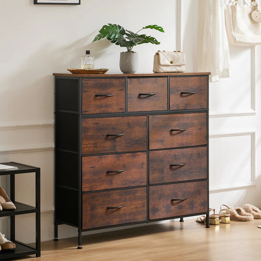 A brown JHK dresser with 9 fabric storage drawers, placed in a bedroom setting with decorative items on top.
