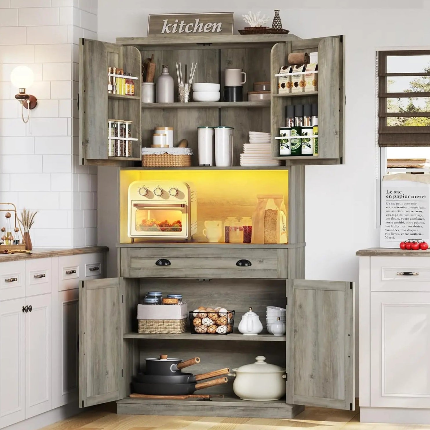 A rustic farmhouse kitchen pantry cabinet with LED lighting and a power strip. It includes multiple shelves, cabinets, and drawers, and is finished in a wood grain texture.