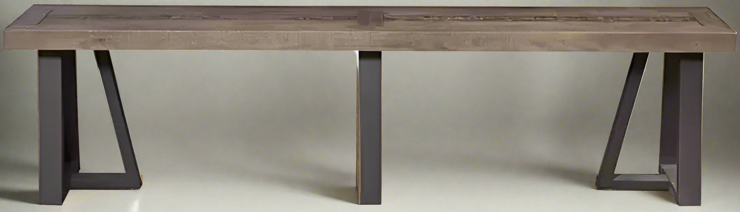 A two-tone bench with a reclaimed natural wood top and a black base, with a slightly distressed finish.