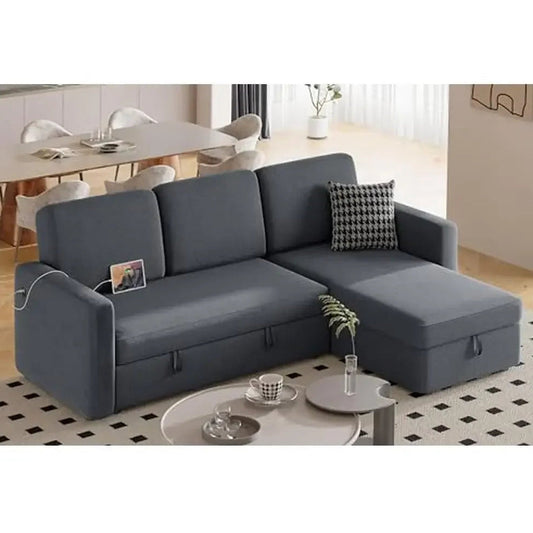 Gray sectional sofa in a living room setting with a coffee table and decor items.