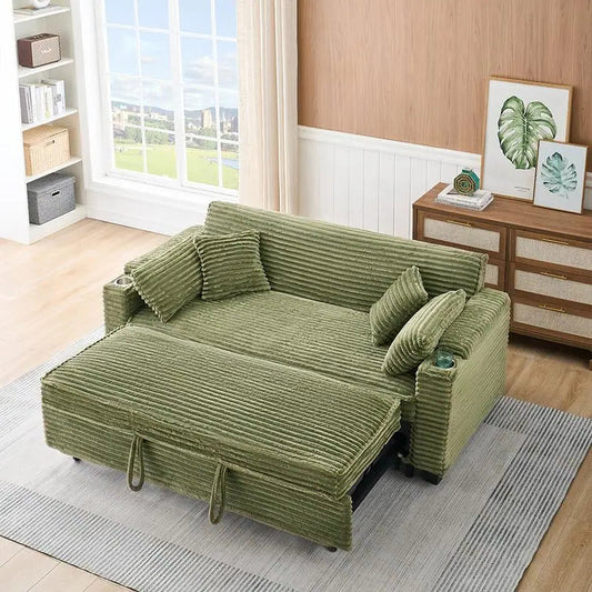 Green sofa bed in a living room setting with a window and furniture in the background.