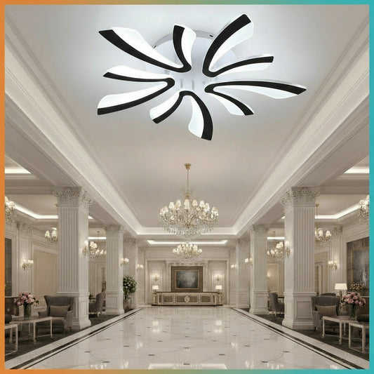 Modern ceiling light fixture in a room with a window and sofa, featuring the brand 'GreeLustr'.