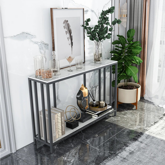 Modern interior with a console table, plant, and decorative items in a stylish living room.