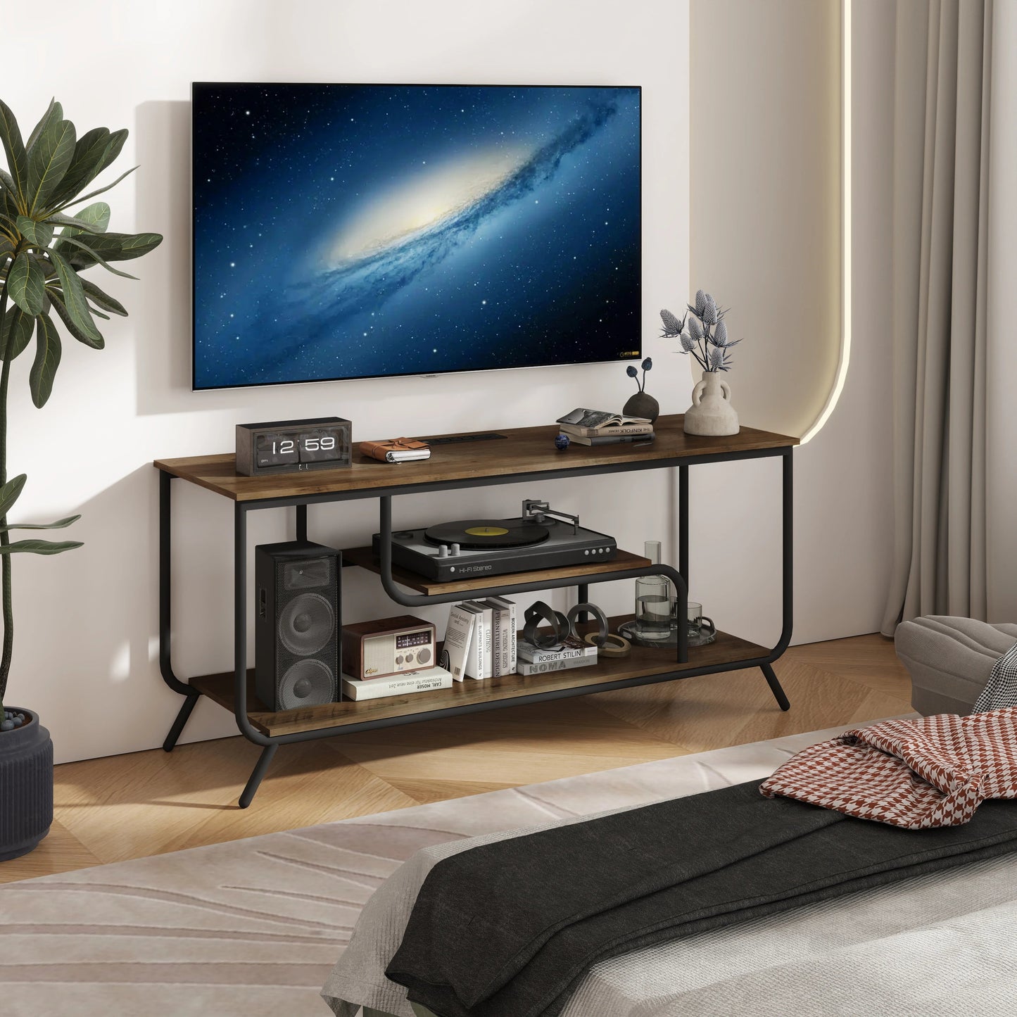 Modern living room with a television on a wooden stand displaying a space scene.